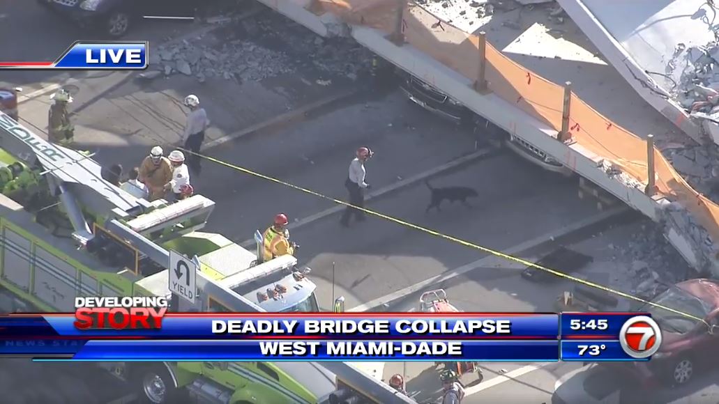 Florida teams search for survivors of pedestrian bridge collapse